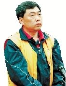 今年4月8日，宋军在青岛市中级法院出庭受审。供图